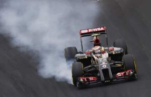 Interlagos, Sao Paulo, Brazil.Saturday 8 November 2014.Pastor Maldonado, Lotus E22 Renault, locks up as he turns in.World Copyright: Steven Tee/Lotus F1.ref: Digital Image _L4R1664