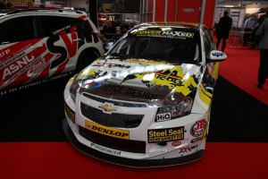 The car of Josh Cook (GBR) Power Maxed Racing on the Dunlop BTCC stand