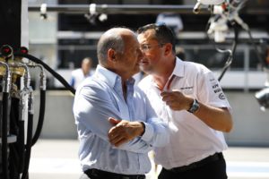 Eric Boullier, Racing Director, McLaren, talks to Ron Dennis, Executive Chairman, McLaren Automotive.