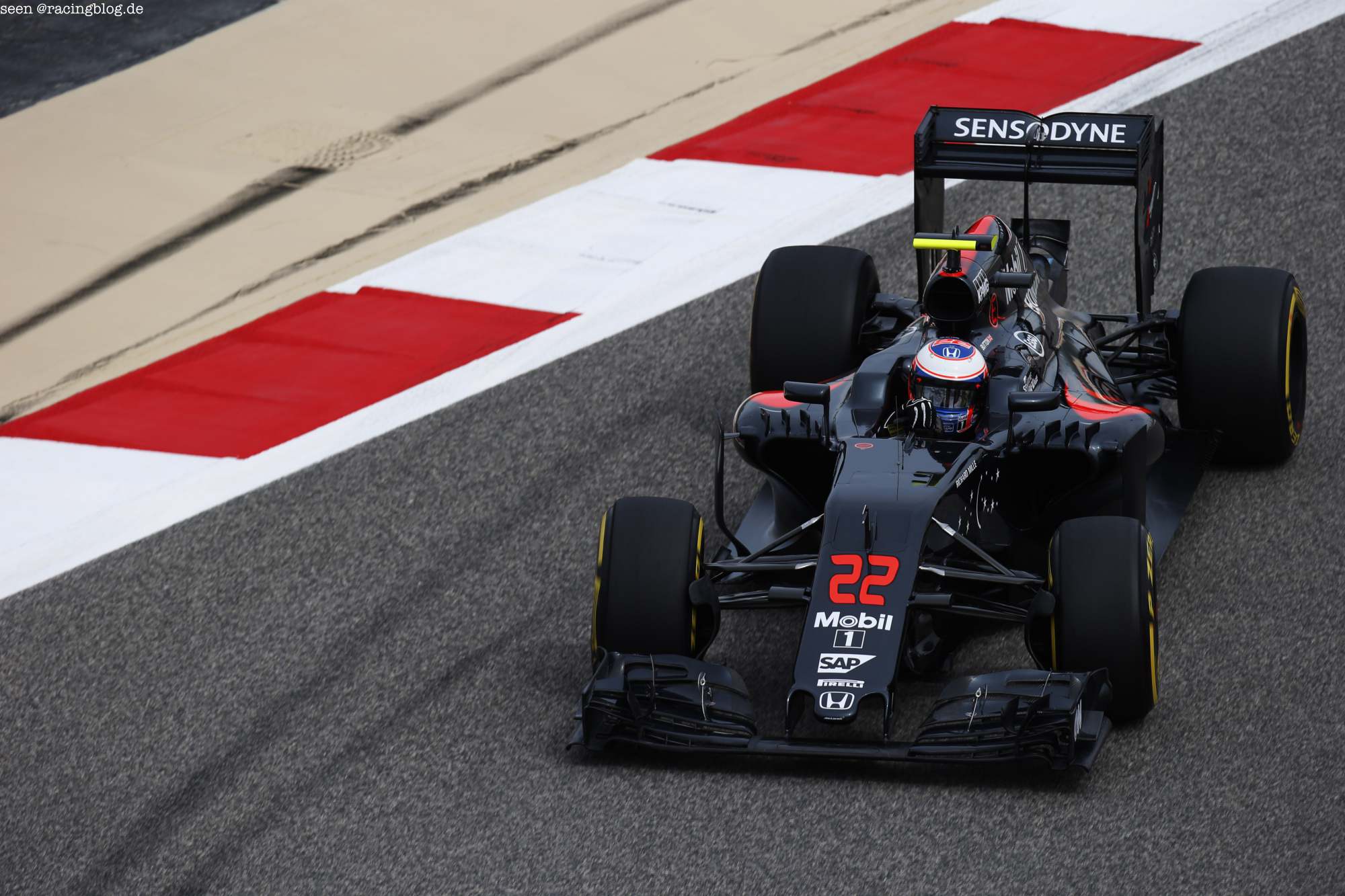 Jenson Button on track.