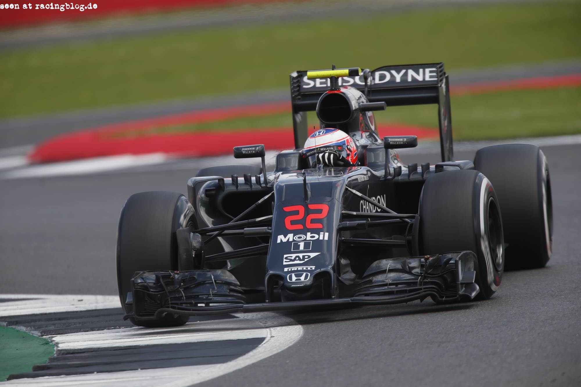 Jenson Button on track.