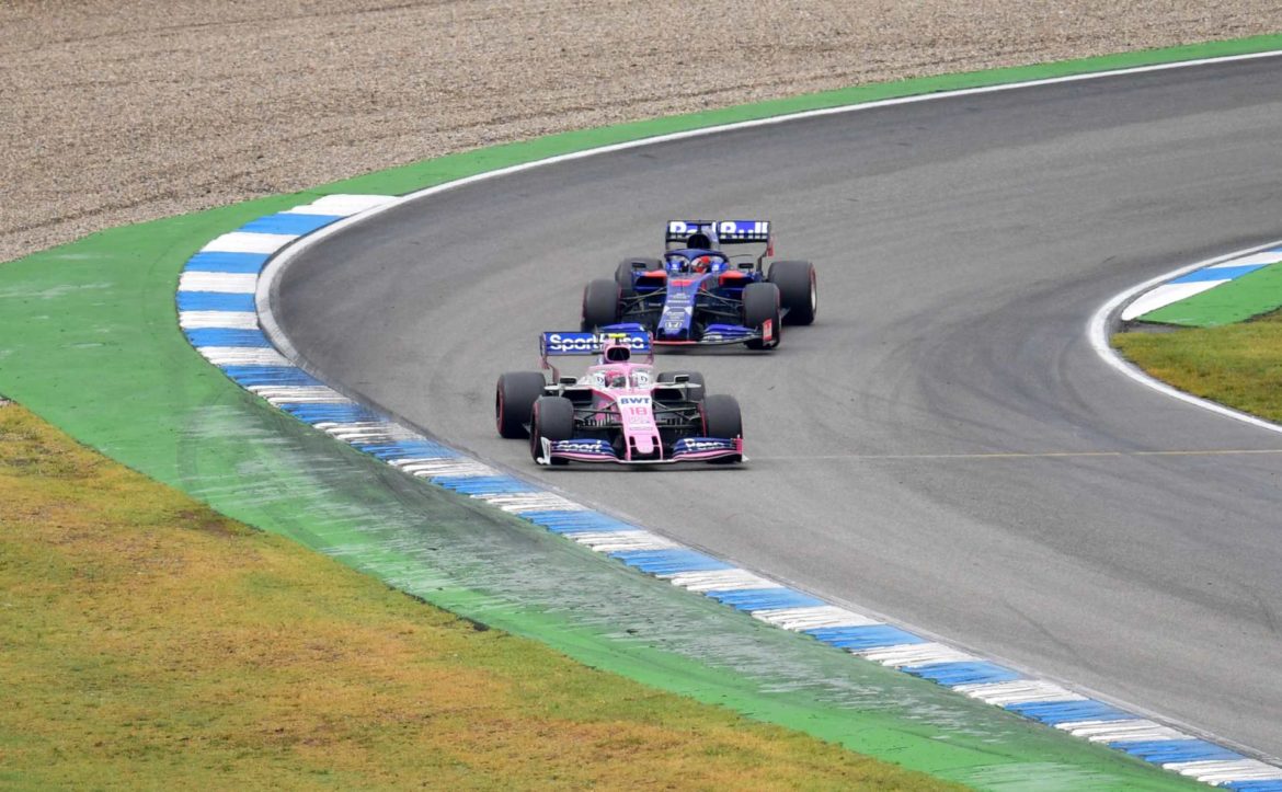 Lance Stroll, Racing Point RP19 and Daniil Kvyat, Toro Rosso STR14