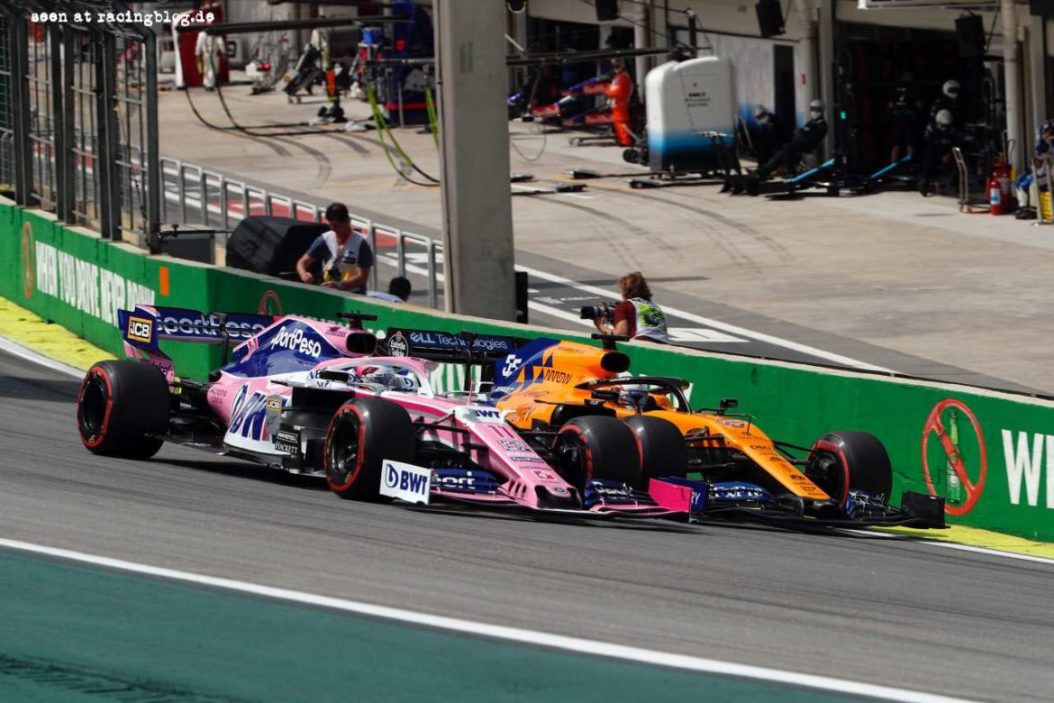 Sergio Perez, Racing Point RP19 and Carlos Sainz Jr., McLaren MCL34