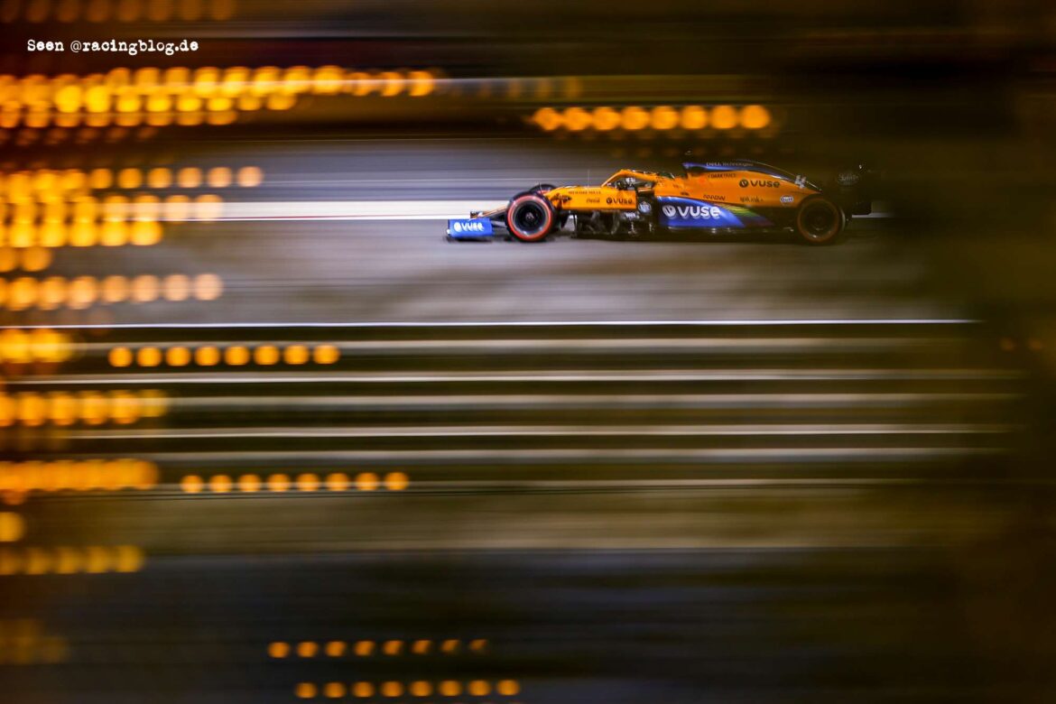 Lando Norris, McLaren MCL35, on a pit straight