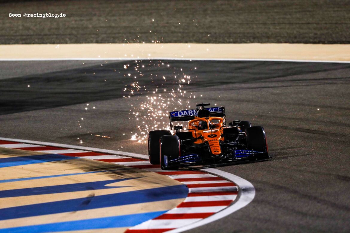 Sparks kick up from Carlos Sainz, McLaren MCL35