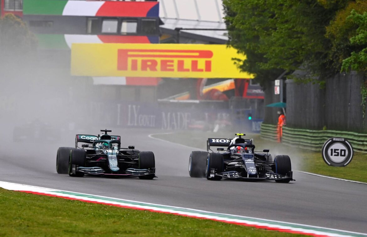 Pierre Gasly, AlphaTauri AT02, battles with Lance Stroll, Aston Martin AMR21