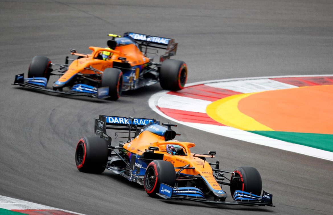Daniel Ricciardo, McLaren MCL35M, leads Lando Norris, McLaren MCL35M mid corner