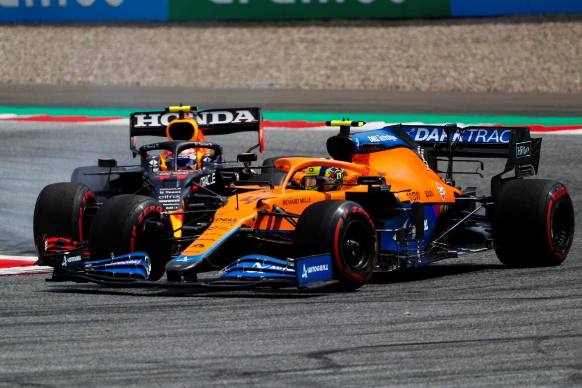 Lando Norris, McLaren MCL35M, leads Sergio Perez, Red Bull Racing RB16B