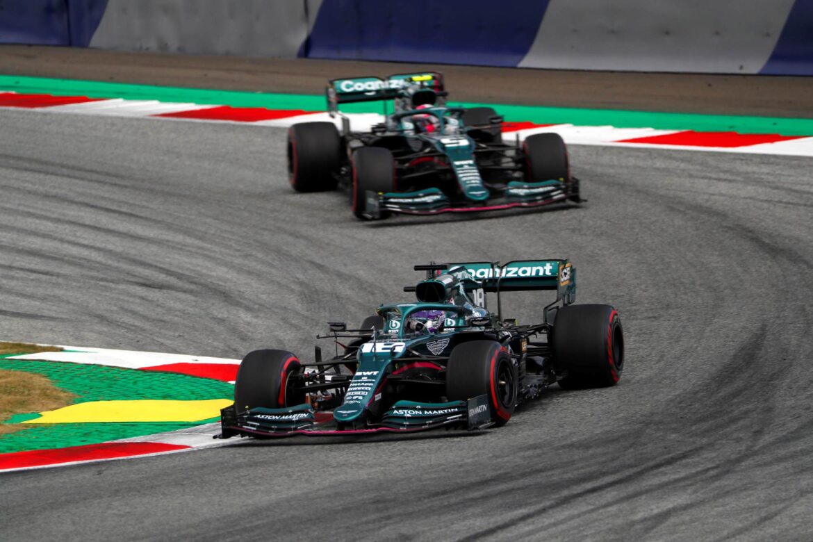 Lance Stroll, Aston Martin AMR21, leads Sebastian Vettel, Aston Martin AMR21