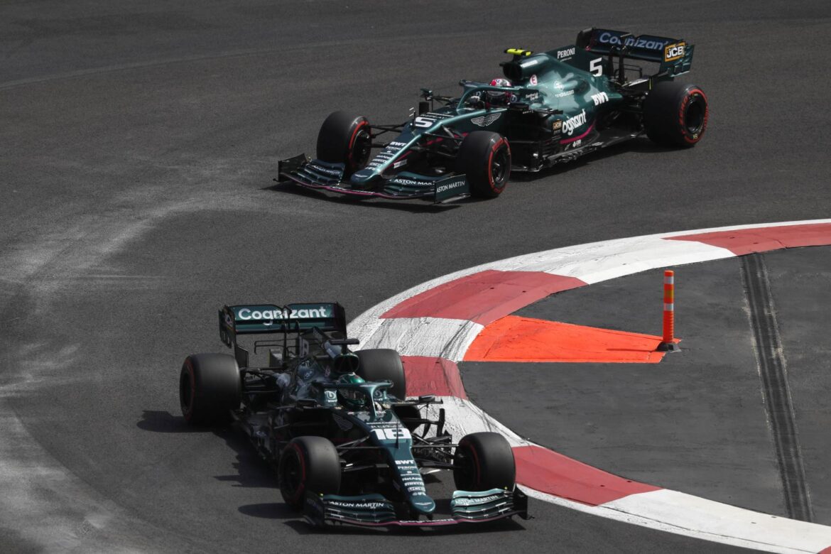 Lance Stroll, Aston Martin AMR21, leads Sebastian Vettel, Aston Martin AMR21