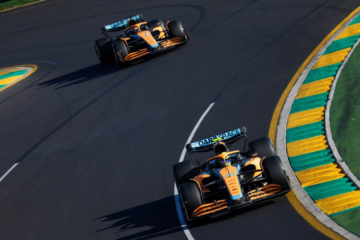 Lando Norris, McLaren MCL36, leads Daniel Ricciardo, McLaren MCL36