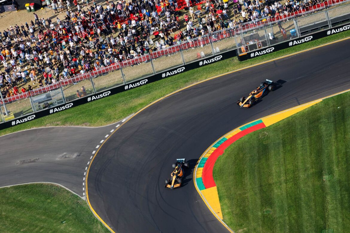 Lando Norris, McLaren MCL36, leads Daniel Ricciardo, McLaren MCL36