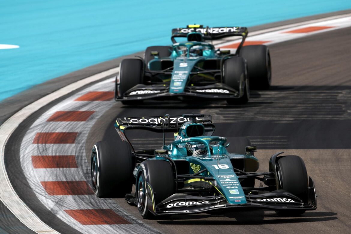 Lance Stroll, Aston Martin AMR22, leads Sebastian Vettel, Aston Martin AMR22