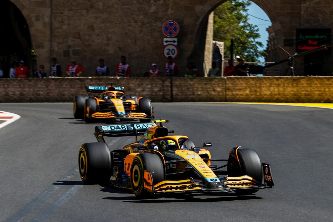 Lando Norris, McLaren MCL36, leads Daniel Ricciardo, McLaren MCL36