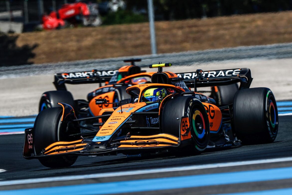 Lando Norris, McLaren MCL36, leads Daniel Ricciardo, McLaren MCL36